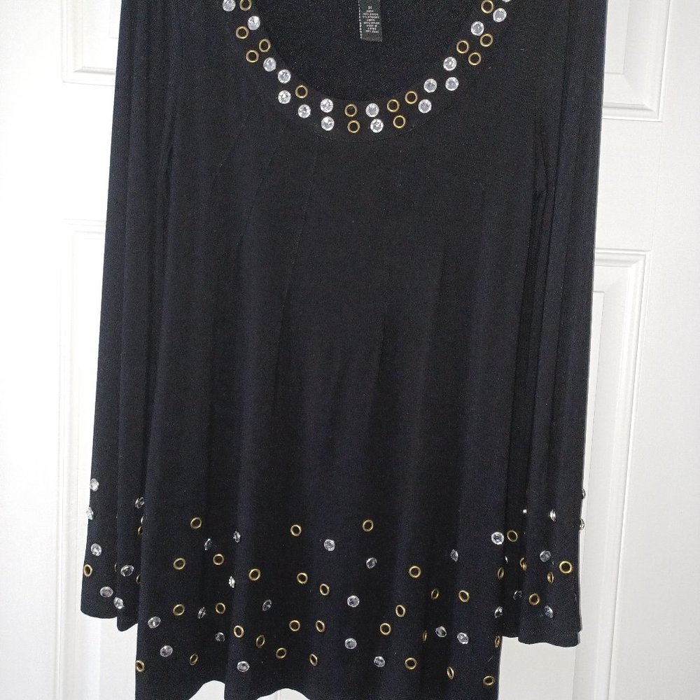 Black mini dress with faux diamonds and grommets.
